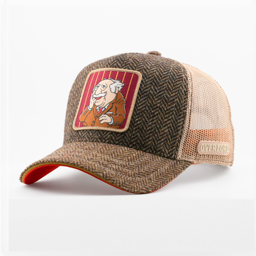Tweed-textured brown herringbone retro trucker cap with a patch of Statler from The Muppets on a maroon striped background, tan mesh back with tan Overlord logo.
