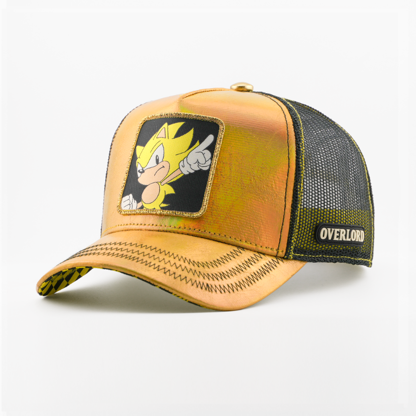 Metallic gold retro trucker cap with a gold-bordered patch of Super Sonic from Sonic the Hedgehog on a black background, gold metallic brim, black mesh back, and Overlord logo.