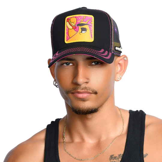 Man wearing black trucker cap hat with black starry mesh featuring Earl from Toejam and Earl on woven patch attached to crown