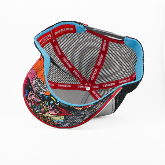 Underside view of the Thor cap showing a comic-print brim, grey mesh crown, and red Overlord branded taping.