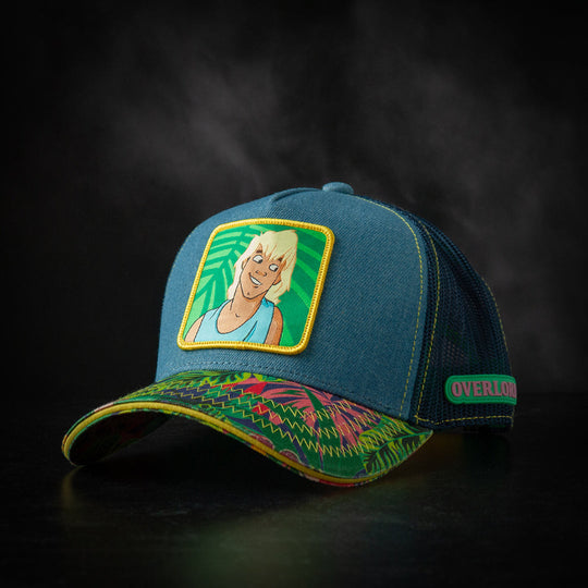 Blue cap with embroidered design on a dark background